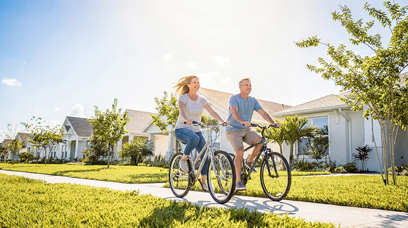 SeaFlower couple Biking through the neighborhood
