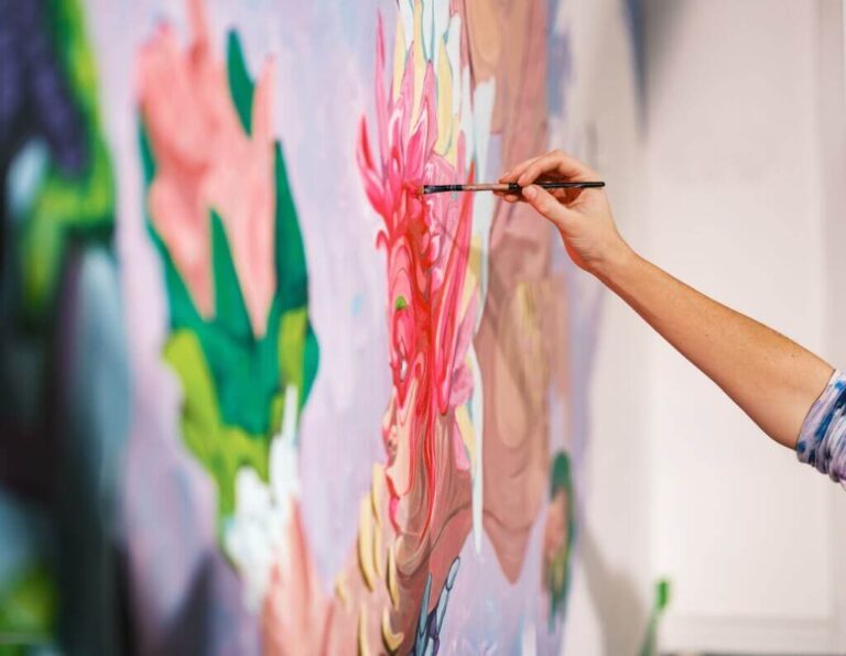 Woman painting at seaflower community event